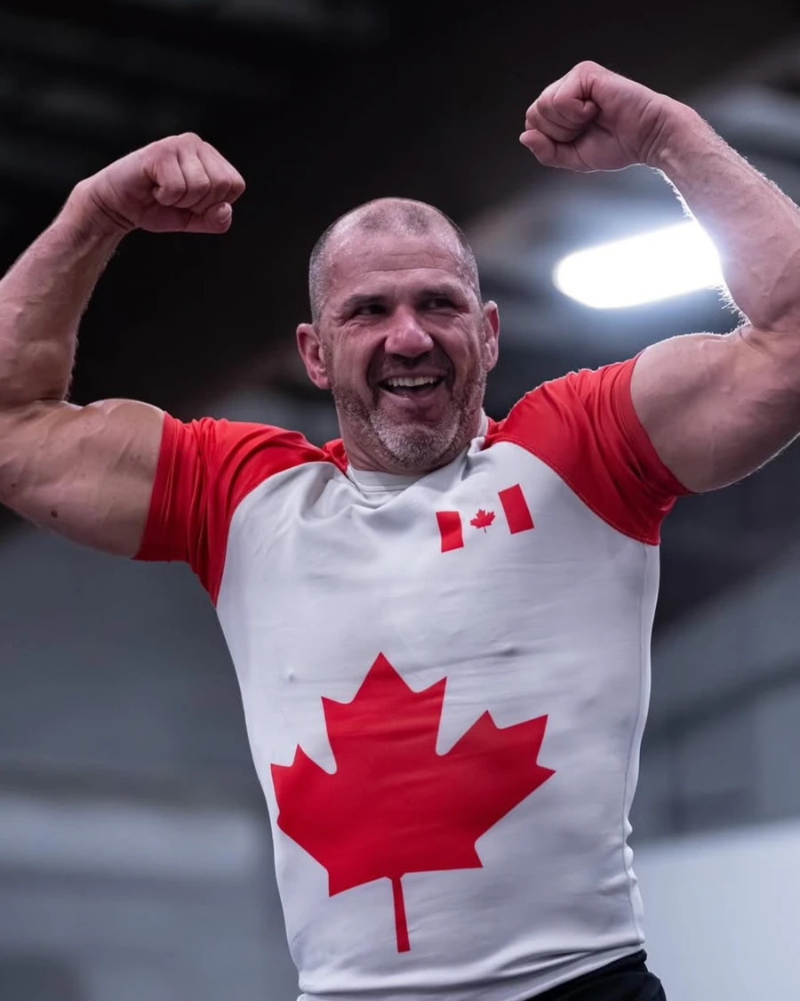 Eamonn Dorgan in a Canada singlet after a match
